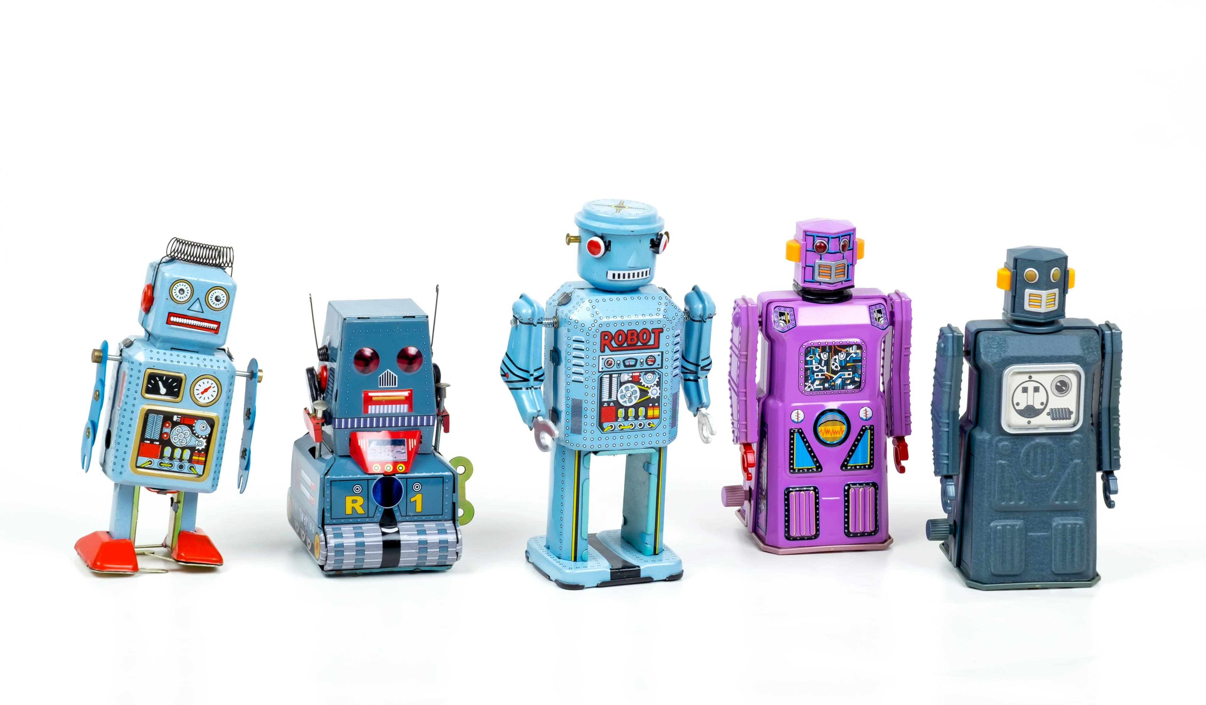 Little toy robots, collection of blue and pink colored.